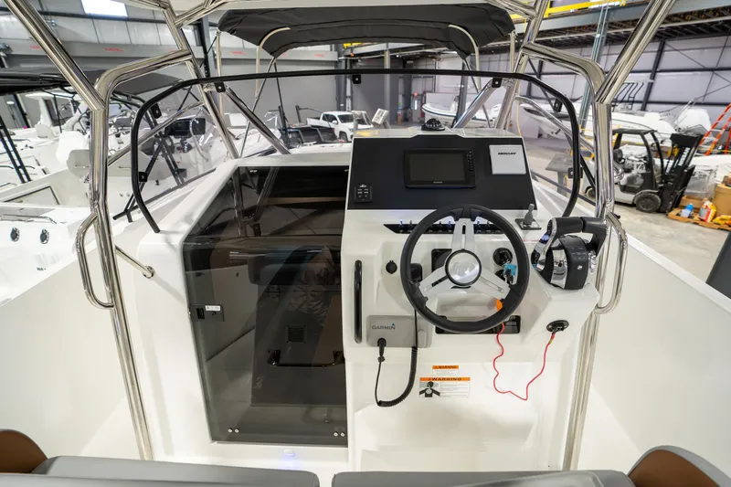  Yacht Photos Pics 2025 Beneteau Flyer 9 SPACEdeck helm with modern controls and navigation system.