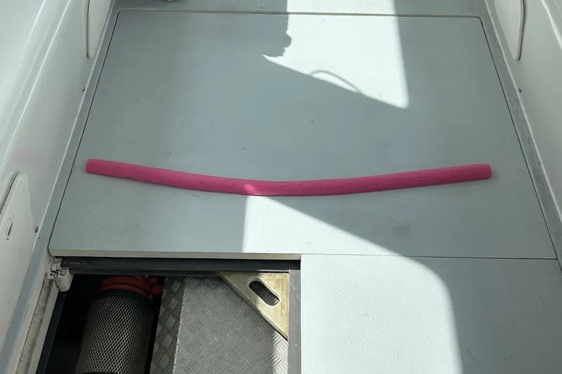  Yacht Photos Pics 2015 Wesmac Sport Fish deck with pink pool noodle and open hatch.