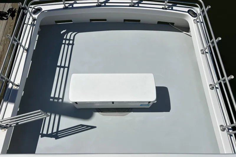  Yacht Photos Pics 2015 Wesmac Sport Fish deck with railing and storage box.