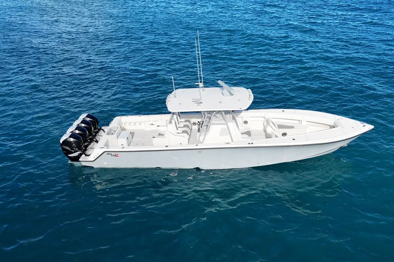  Yacht Photos Pics 2020 SeaVee 390Z boat on clear blue water, featuring multiple outboard engines.