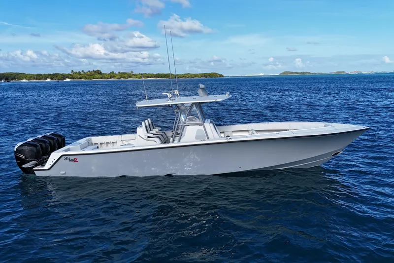  Yacht Photos Pics 2020 SeaVee 390Z boat on blue ocean with clear sky background.