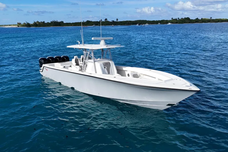  Yacht Photos Pics 2020 SeaVee 390Z boat on clear blue water, featuring multiple outboard engines.