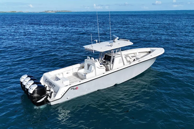  Yacht Photos Pics 2020 SeaVee 390Z boat on open ocean, featuring multiple outboard engines.