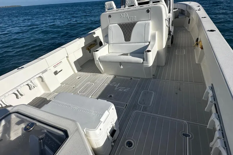  Yacht Photos Pics 2020 SeaVee 390Z boat interior with seating and open deck on the ocean.