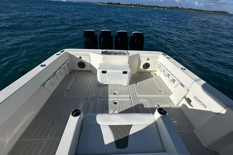  Yacht Photos Pics 2020 SeaVee 390Z boat deck with seating, ocean view, and multiple outboard engines.