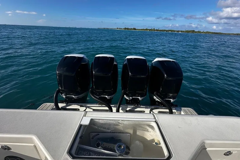  Yacht Photos Pics 2020 SeaVee 390Z boat with four powerful outboard engines on open water.