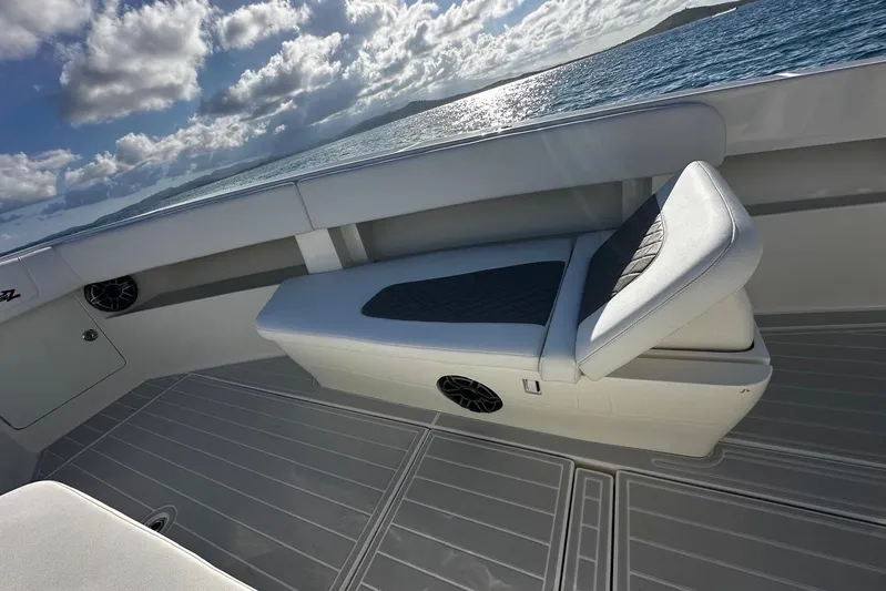  Yacht Photos Pics 2020 SeaVee 390Z boat interior with cushioned seating and ocean view.