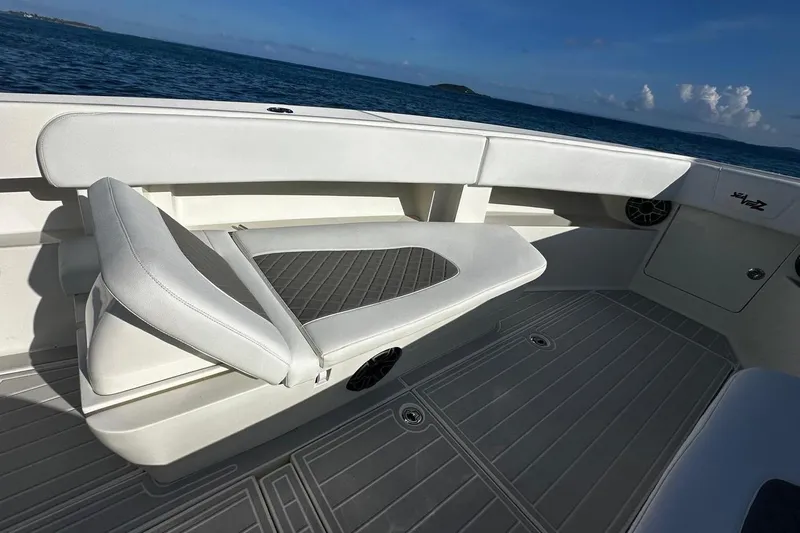  Yacht Photos Pics 2020 SeaVee 390Z boat interior with cushioned seating and ocean view.