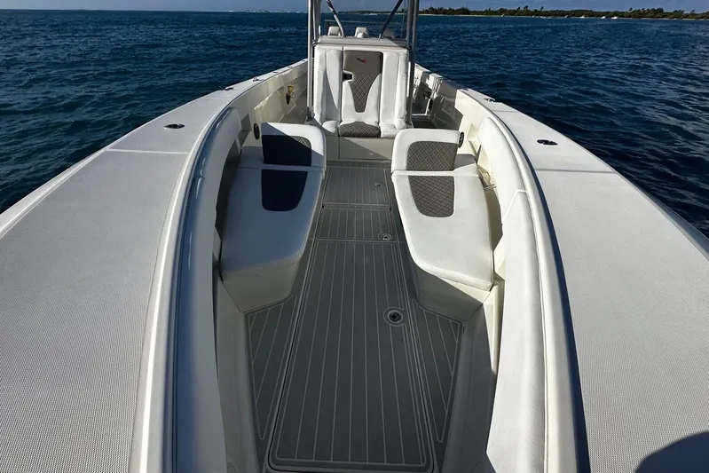  Yacht Photos Pics 2020 SeaVee 390Z boat interior with cushioned seating, on open water.