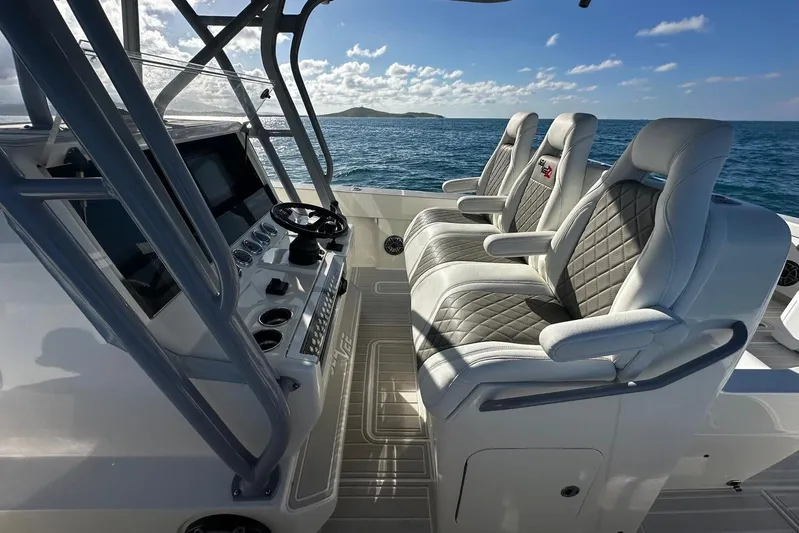  Yacht Photos Pics 2020 SeaVee 390Z boat interior with luxurious seating and modern dashboard on open water.