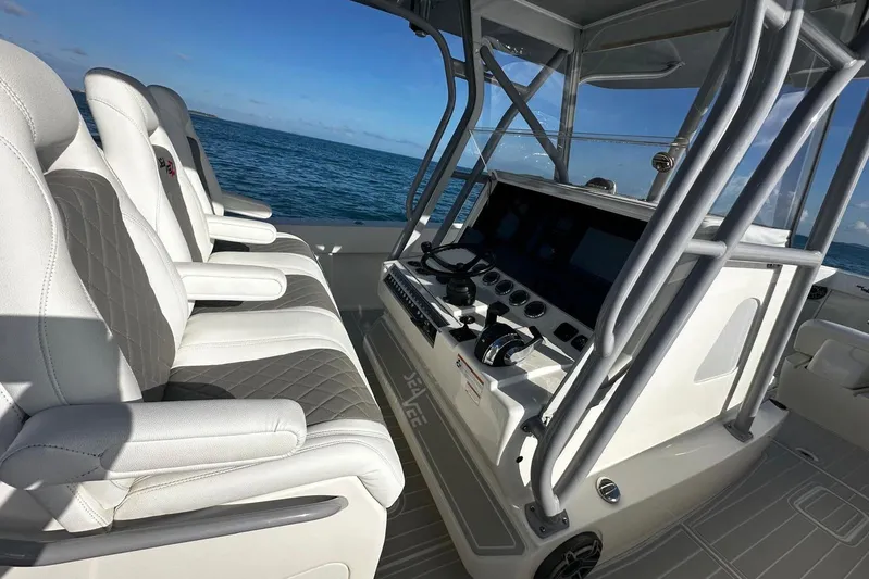  Yacht Photos Pics 2020 SeaVee 390Z boat interior with luxury seating and modern control panel.