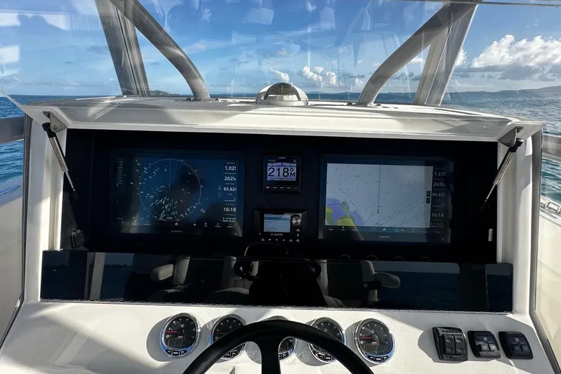  Yacht Photos Pics Dashboard of 2020 SeaVee 390Z boat with navigation screens and gauges.