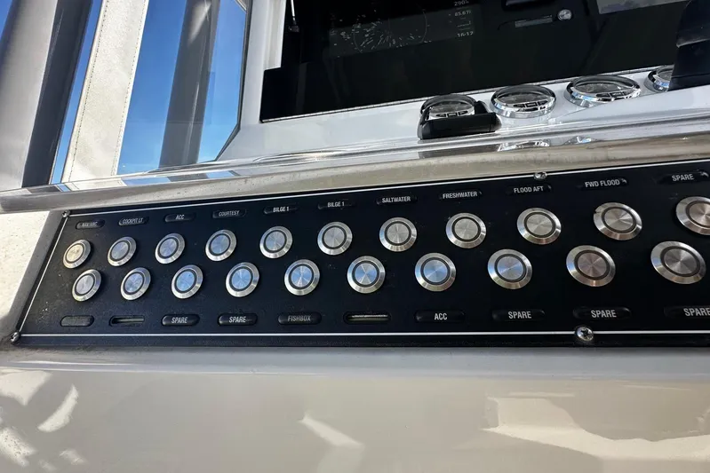  Yacht Photos Pics Control panel of a 2020 SeaVee 390Z boat with various labeled buttons.