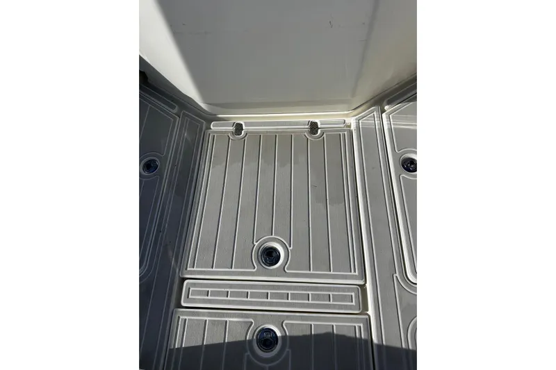  Yacht Photos Pics 2020 SeaVee 390Z boat deck with textured flooring and drainage features.