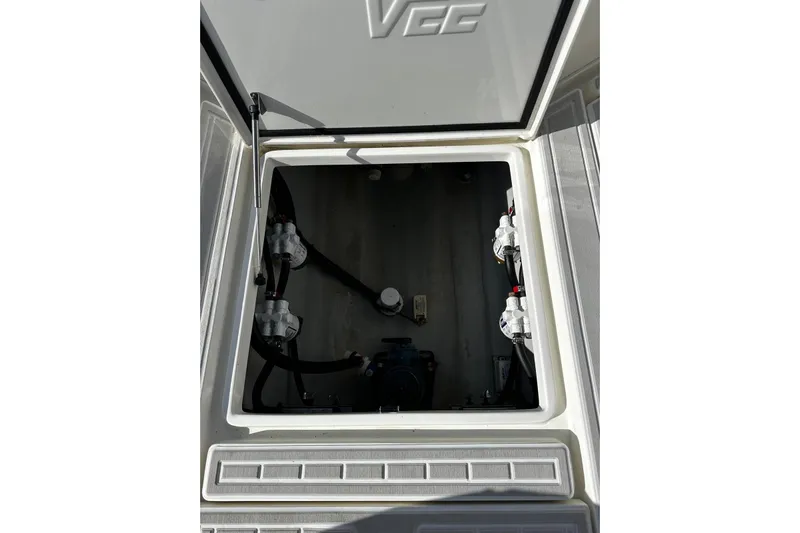  Yacht Photos Pics 2020 SeaVee 390Z boat compartment with visible plumbing and equipment.