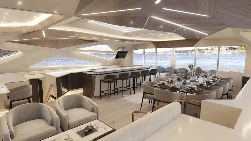 Laniakea Yacht Photos Pics Luxurious interior of 2026 Latitude 46 Catamaran with modern dining and seating areas.