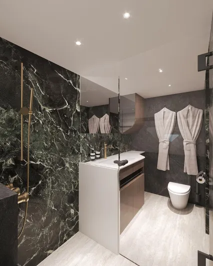 Laniakea Yacht Photos Pics Luxurious bathroom in 2026 Latitude 46 Catamaran with marble walls and modern fixtures.