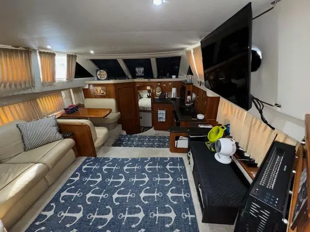 Diversion Yacht Photos Pics Interior of 2006 Carver 36 Motor Yacht with cozy seating and nautical decor.