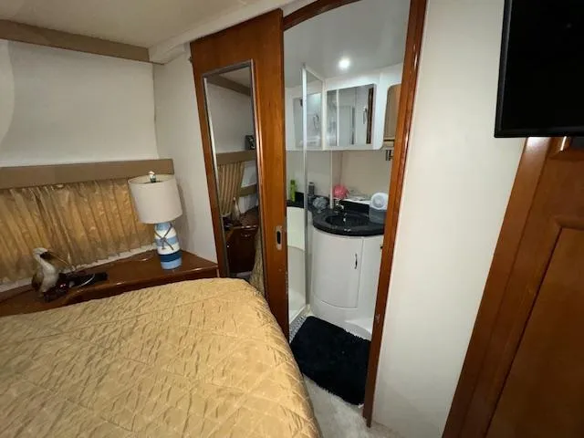 Diversion Yacht Photos Pics Interior of 2006 Carver 36 Motor Yacht with bedroom and bathroom view.