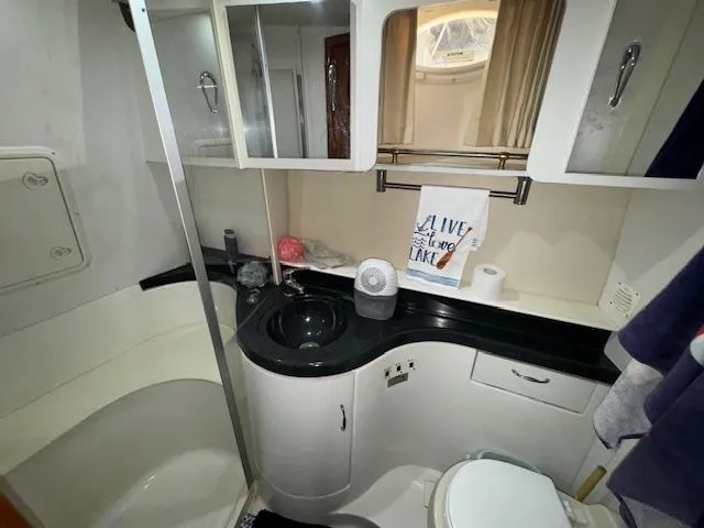 Diversion Yacht Photos Pics Bathroom interior of 2006 Carver 36 Motor Yacht with modern amenities.