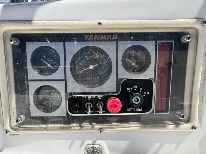 Memories Yacht Photos Pics Control panel of a 2004 Hunter 466 boat with Yanmar engine gauges.