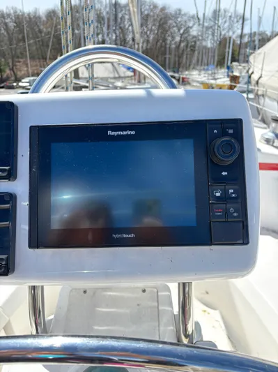 Memories Yacht Photos Pics Raymarine navigation system on 2004 Hunter 466 sailboat, featuring a hybrid touch display.