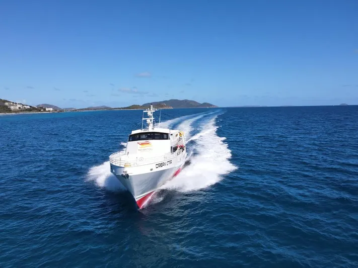 Dream Star Yacht Photos Pics High-speed passenger ferry by Midship Marine, 1981, cruising on open sea under clear blue sky.