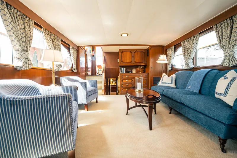 Coconut Yacht Photos Pics Luxurious interior of a 1964 Burger 64' Motor Yacht with elegant seating and decor.