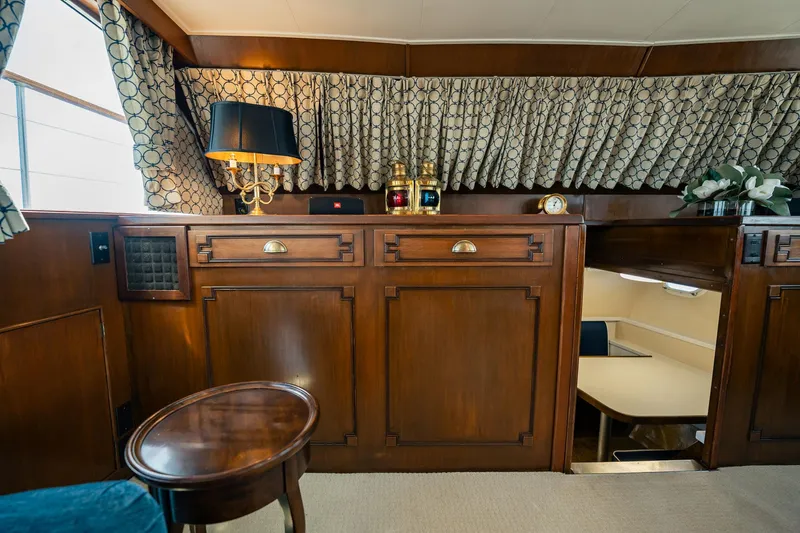 Coconut Yacht Photos Pics Luxurious interior of a 1964 Burger 64' Motor Yacht with elegant wood paneling.