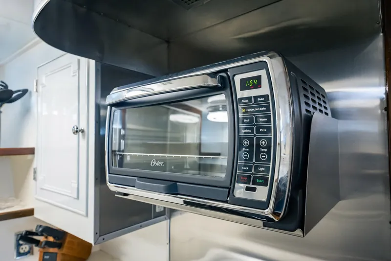 Coconut Yacht Photos Pics Oster countertop oven in a 1964 Burger 64' Motor Yacht kitchen.