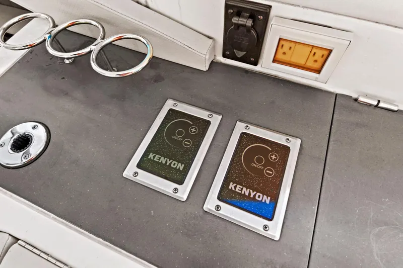 Sensei I Yacht Photos Pics 2021 Sea Ray SLX 400 boat interior with Kenyon control panels and power outlets.