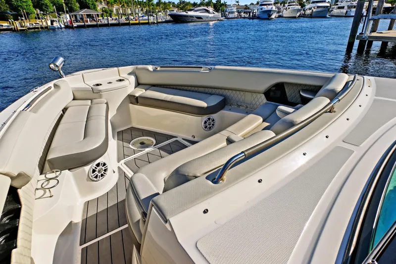 Sensei I Yacht Photos Pics 2021 Sea Ray SLX 400 boat interior with luxurious seating and waterfront view.