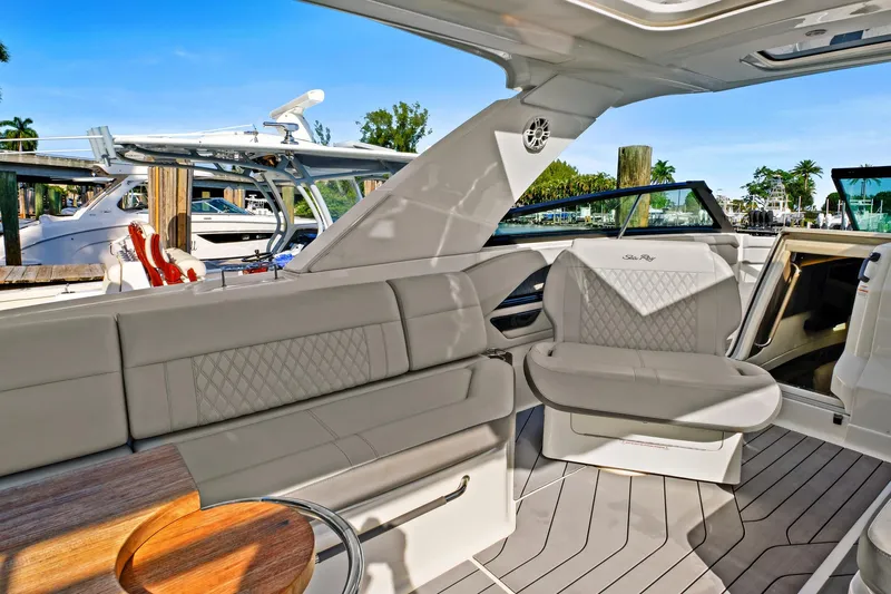 Sensei I Yacht Photos Pics 2021 Sea Ray SLX 400 boat interior with luxurious seating and modern design.