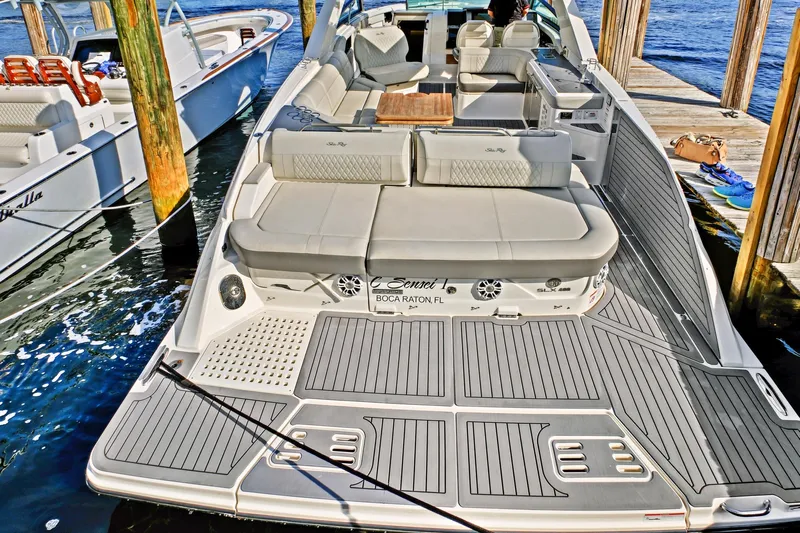 Sensei I Yacht Photos Pics 2021 Sea Ray SLX 400 luxury boat docked, featuring spacious seating and elegant design.