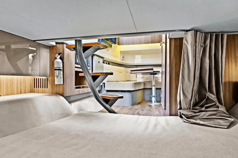 Sensei I Yacht Photos Pics Interior of 2021 Sea Ray SLX 400 yacht, featuring modern design and cozy seating area.