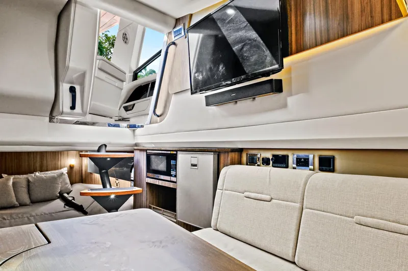 Sensei I Yacht Photos Pics Luxurious interior of 2021 Sea Ray SLX 400 yacht with modern amenities and elegant design.