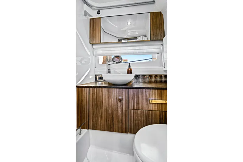 Sensei I Yacht Photos Pics Luxurious bathroom interior of 2021 Sea Ray SLX 400 yacht with modern fixtures.