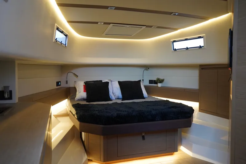  Yacht Photos Pics Luxurious interior of 2025 Pardo Yachts 43, featuring a modern, well-lit bedroom.