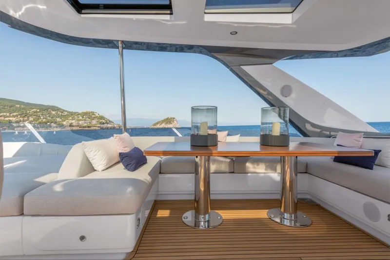 Dejavu Yacht Photos Pics Luxurious interior of 2020 Azimut 78 yacht with elegant seating and ocean view.