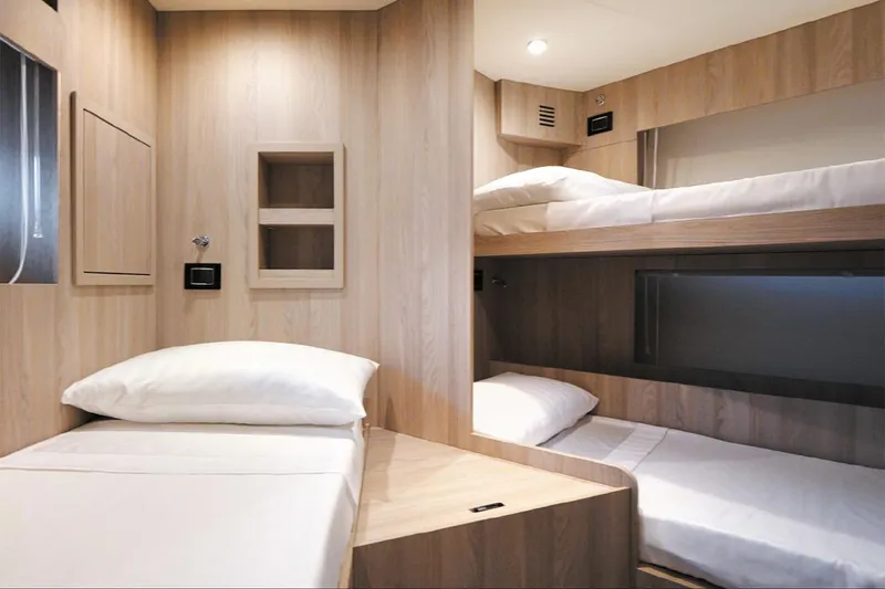Dejavu Yacht Photos Pics Interior of 2020 Azimut 78 yacht featuring modern wooden bunk beds.