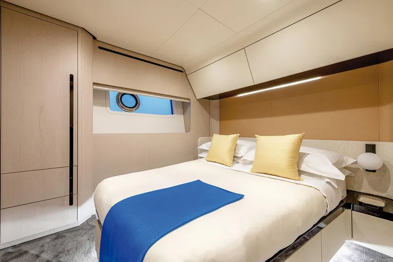 Dejavu Yacht Photos Pics Luxurious bedroom interior of 2020 Azimut 78 yacht with modern design and elegant furnishings.