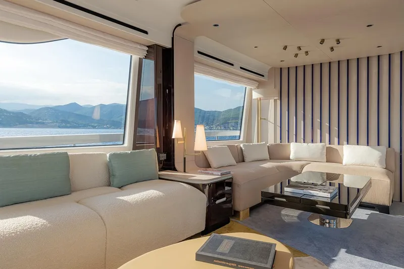 Dejavu Yacht Photos Pics Luxurious interior of 2020 Azimut 78 yacht with panoramic windows and elegant seating.