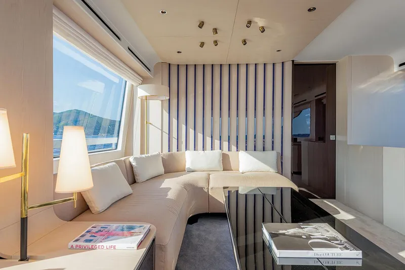 Dejavu Yacht Photos Pics Luxurious interior of 2020 Azimut 78 yacht with elegant seating and modern decor.