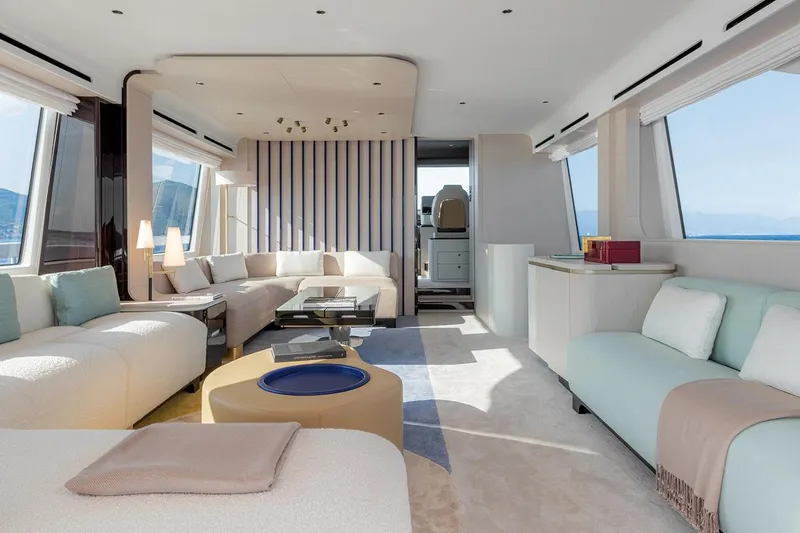 Dejavu Yacht Photos Pics Luxurious interior of 2020 Azimut 78 yacht with modern furnishings and panoramic windows.