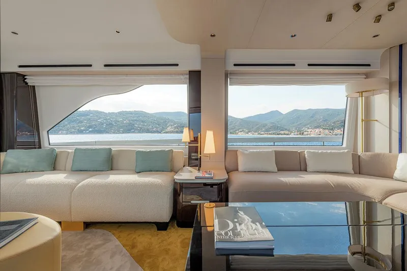 Dejavu Yacht Photos Pics Luxurious interior of 2020 Azimut 78 yacht with scenic ocean view through large windows.