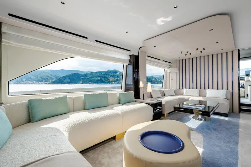 Dejavu Yacht Photos Pics Luxurious interior of a 2020 Azimut 78 yacht with panoramic windows and elegant seating.