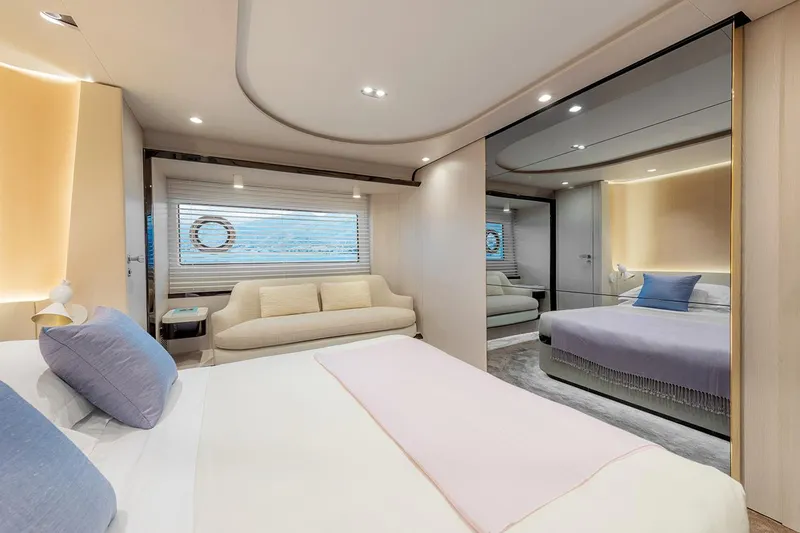 Dejavu Yacht Photos Pics Luxurious bedroom interior of 2020 Azimut 78 yacht with modern design and elegant furnishings.
