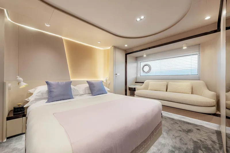 Dejavu Yacht Photos Pics Luxurious bedroom interior of 2020 Azimut 78 yacht with modern design and elegant furnishings.
