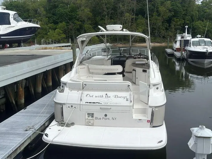 Out With The Buoys II Yacht Photos Pics 2009 Regal Commodore 4060 yacht docked at marina, Blue Point, NY.