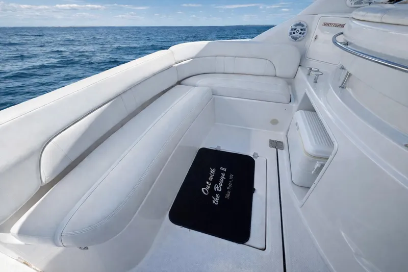 Out With The Buoys II Yacht Photos Pics 2009 Regal Commodore 4060 yacht interior with white seating and ocean view.